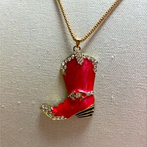 Cowboy Boot necklace, New with Tags. Pink in color, with a 28” chain.